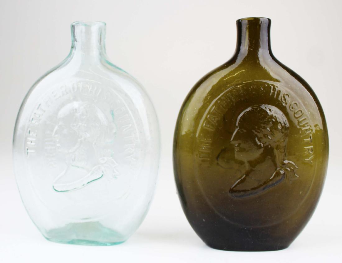 two Washington Taylor portrait flasks: two Washington/ Taylor portrait historical flask, (GI-38), green pint (some surface wear on high spots), aqua pint (fairly crisp), Dyotteville Glass Works