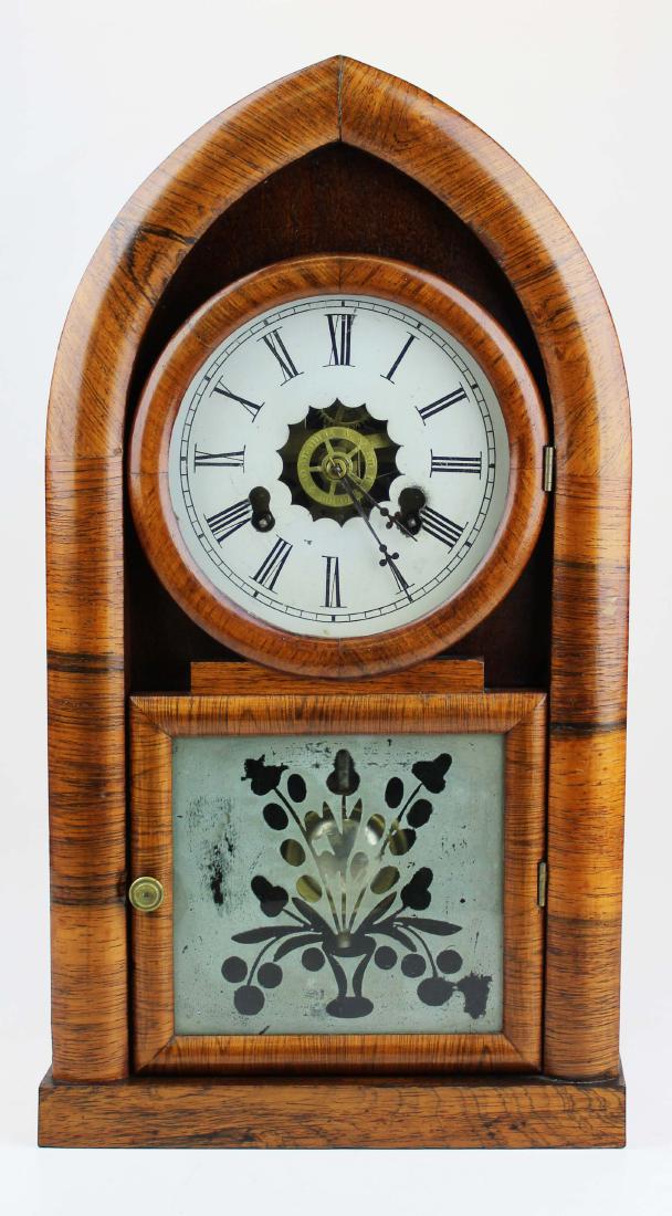 Welch rosewood beehive shelf clock: E N Welch rosewood beehive shelf clock. Original frosted floral motif panel, good condition, with key and pendulum. 19" h.