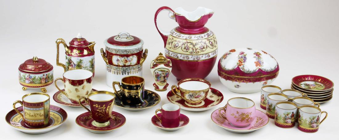 Austrian porcelain demitasse cups and saucers, &c: collection of 25 pcs. late 19th and early 20th c. Austrian scenic decorated porcelain including egg covered box, 3 fine hand painted demitasse cups and saucers with beehive mark (one with hairline che
