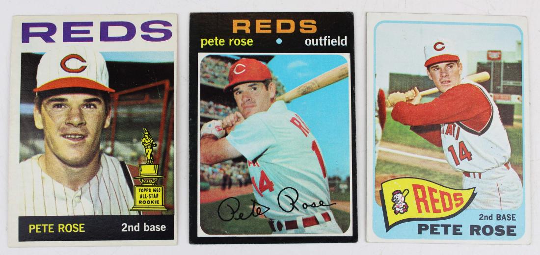 3 Pete Rose baseball cards: A group of 3 Pete Rose baseball cards 1964 Topps near mint, 1965 Topps, 1971 Topps.