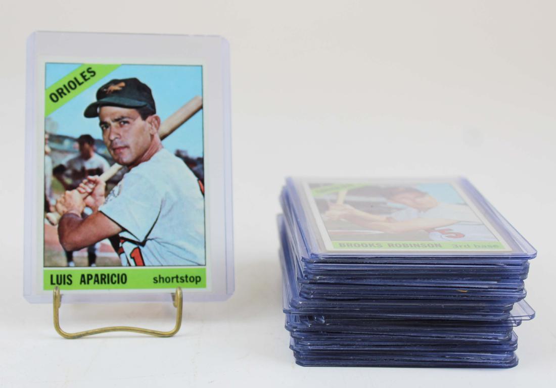 25 Baseball Hall of Fame player cards: A group of 25 cards all baseball Hall of Fame members. 1954 Bowman Bob Feller, 1954 Topps Rookie card Hoyt Wilhelm, 1968 Topps Tom Seaver, and more.