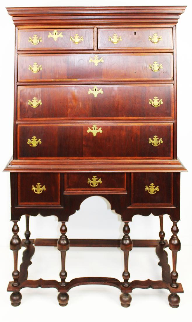 18th c. William and Mary flat top highboy: 18th c. William and Mary walnut flat top highboy with upper case having concealed drawer in crown molding, two drawers over 3 large drawers with herringbone veneer borders, set on base having 3 drawer