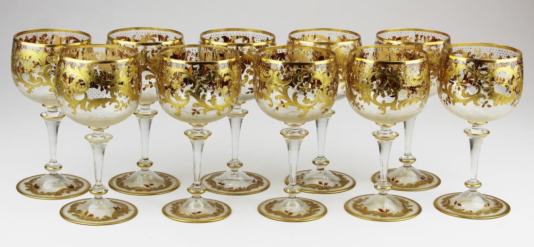 set of 10 Moser gilt enamel wine glasses: outstanding set of 10 fine 19th c. attributed Moser wine glasses with gilt raised enamel floral and rococo motif decoration on bowls and bases 6.75" x 3.5"