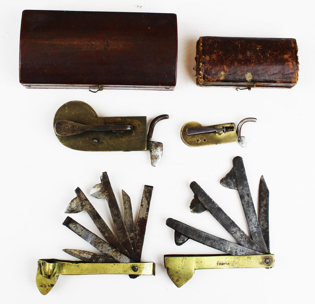 four 19th c brass fleams: four 19th c brass fleams, two with original cases, lengths 2 1/4" to 3 1/2" A fleam, a early medical devise also flem, flew, flue, fleame, or phleam, was a handheld instrument used for bloodletting.