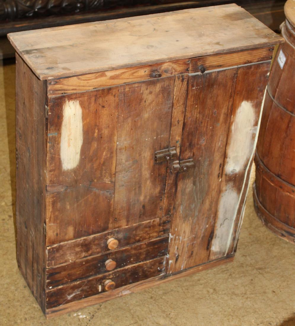 primitive hanging wall cupboard: Primitive Hanging wall cupboard with two doors and three drawers. 27 x 31 x 10"