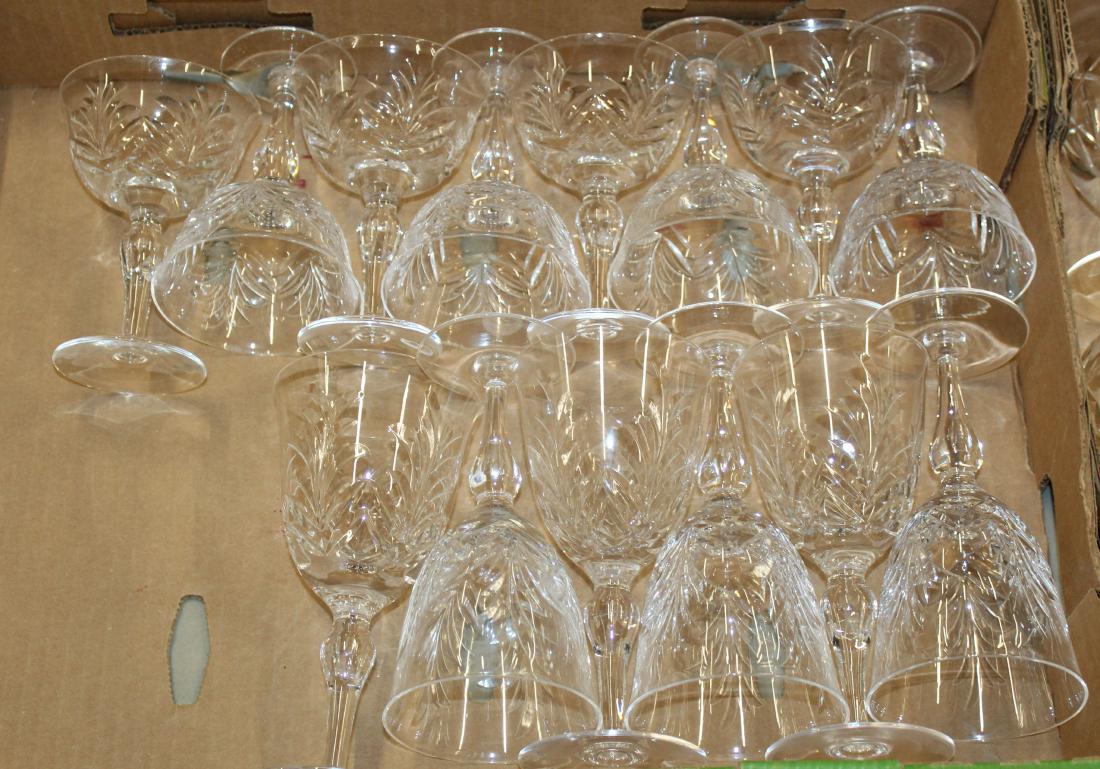 14 pcs. signed Stuart cut crystal stemware: 14 pcs. signed Stuart cut crystal stemware including 6 wine glasses and 8 champagne glasses ht. 5", 7" -2 with rim chips