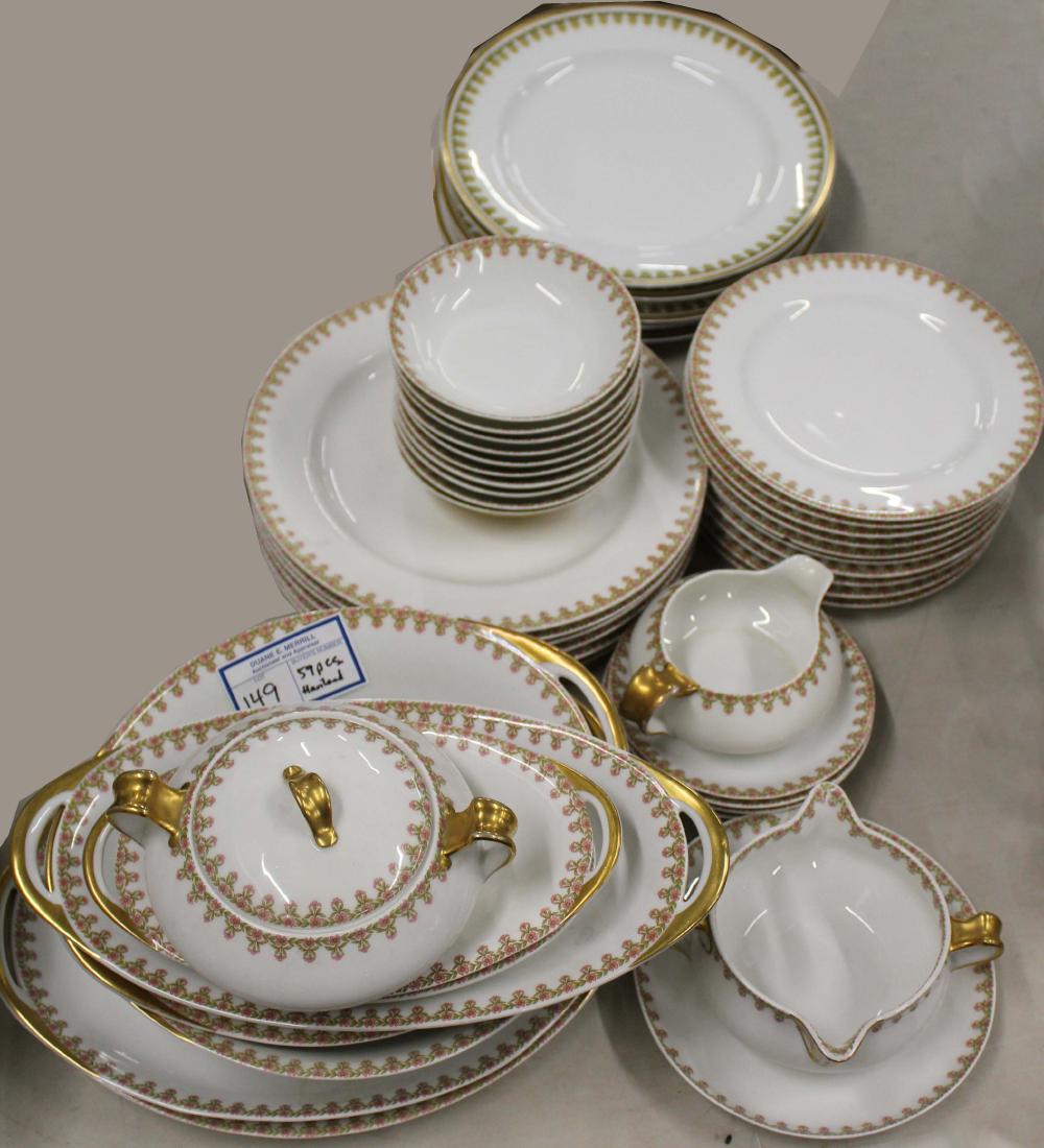 59 pcs. Haviland Limoges porcelain dinnerware: 59 pcs. Ca. 1910 Haviland and Co. Limoges porcelain dinnerware having simple green and pink floral border, including dinner plates, serving pieces, sugar and creamer set -some pieces with rim chips