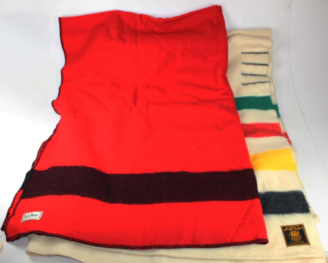 Two wool "Hudson Bay" Style Blankets: Early Winter Point Blanket -full sized 4 point blanket in white, with multi colored stripes and LL Bean red and black wool full size blanket both in excellent condition.