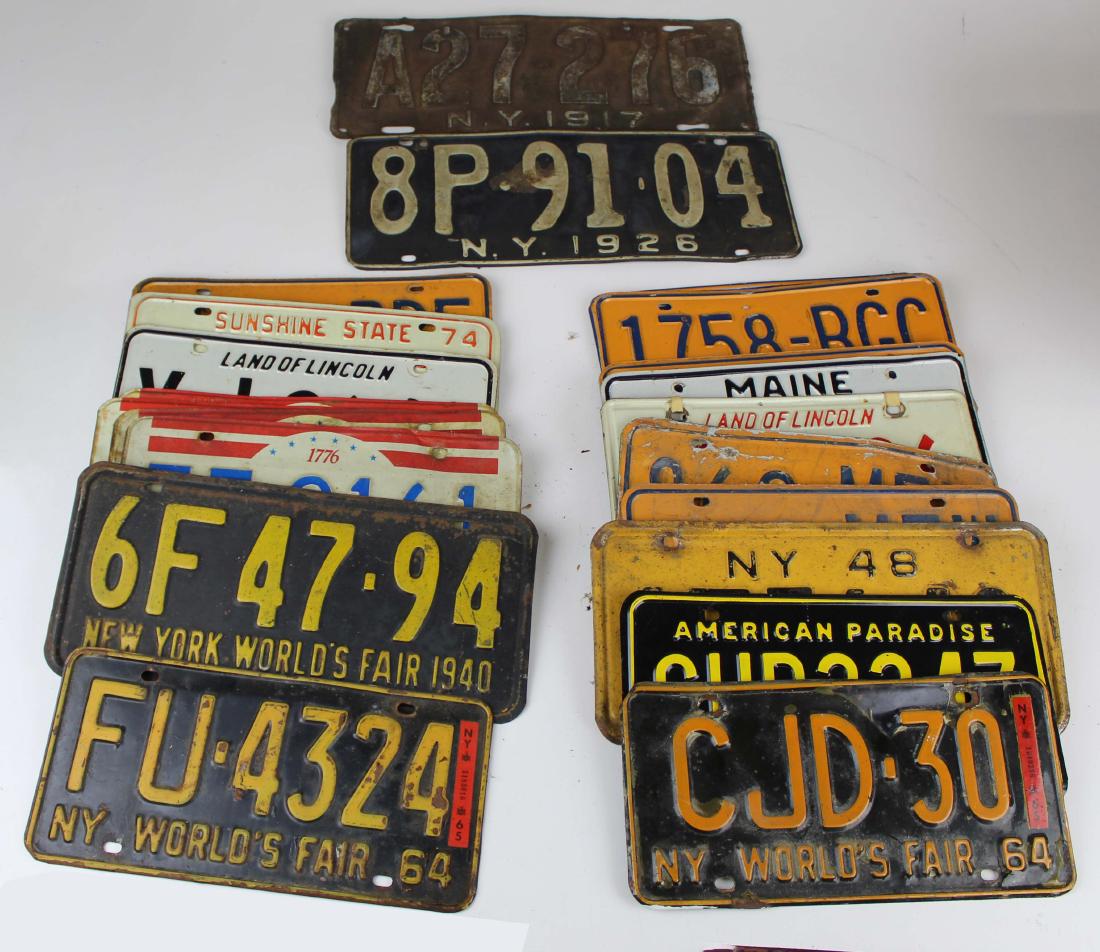 Approximately 56 20th c Steel license plates: Approximately 56 20th c stamped steel license plates 1917-1980's most appear to be 1950's -70's NY, VT, WI, ME, IL,FL,NC, 1940 and 1964 NY Worlds Fair License plates, Bicentennial Etc.