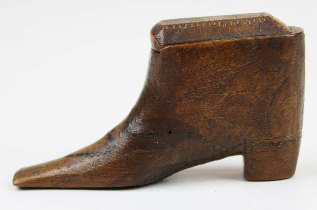 18th c heart decorated shoe form snuff box: 18th c hand carved shoe form snuff box with slide top decorated with heart shaped design, additional carving, length 3 3/8"