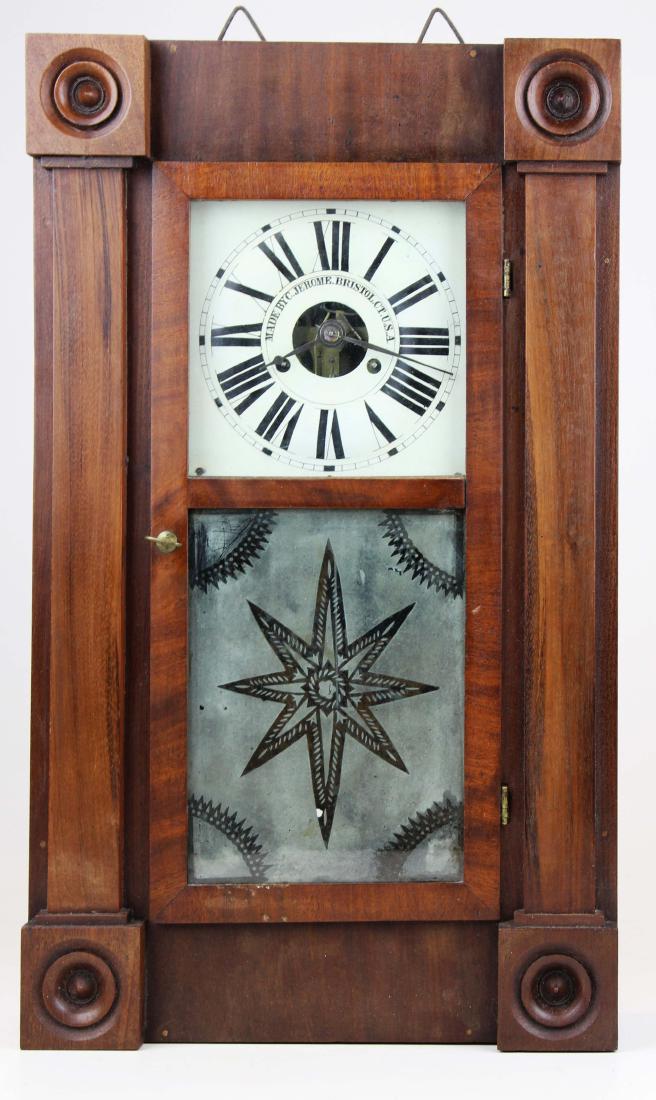 Chauncey & Jerome Bristol CT miniature clock: Chauncey & Jerome Bristol CT (1843-1845) mahogany miniature shelf clock with rosette corners, frosted star lower panel door, 1 day brass works, rare movement, painted tin face with clock makers name. 