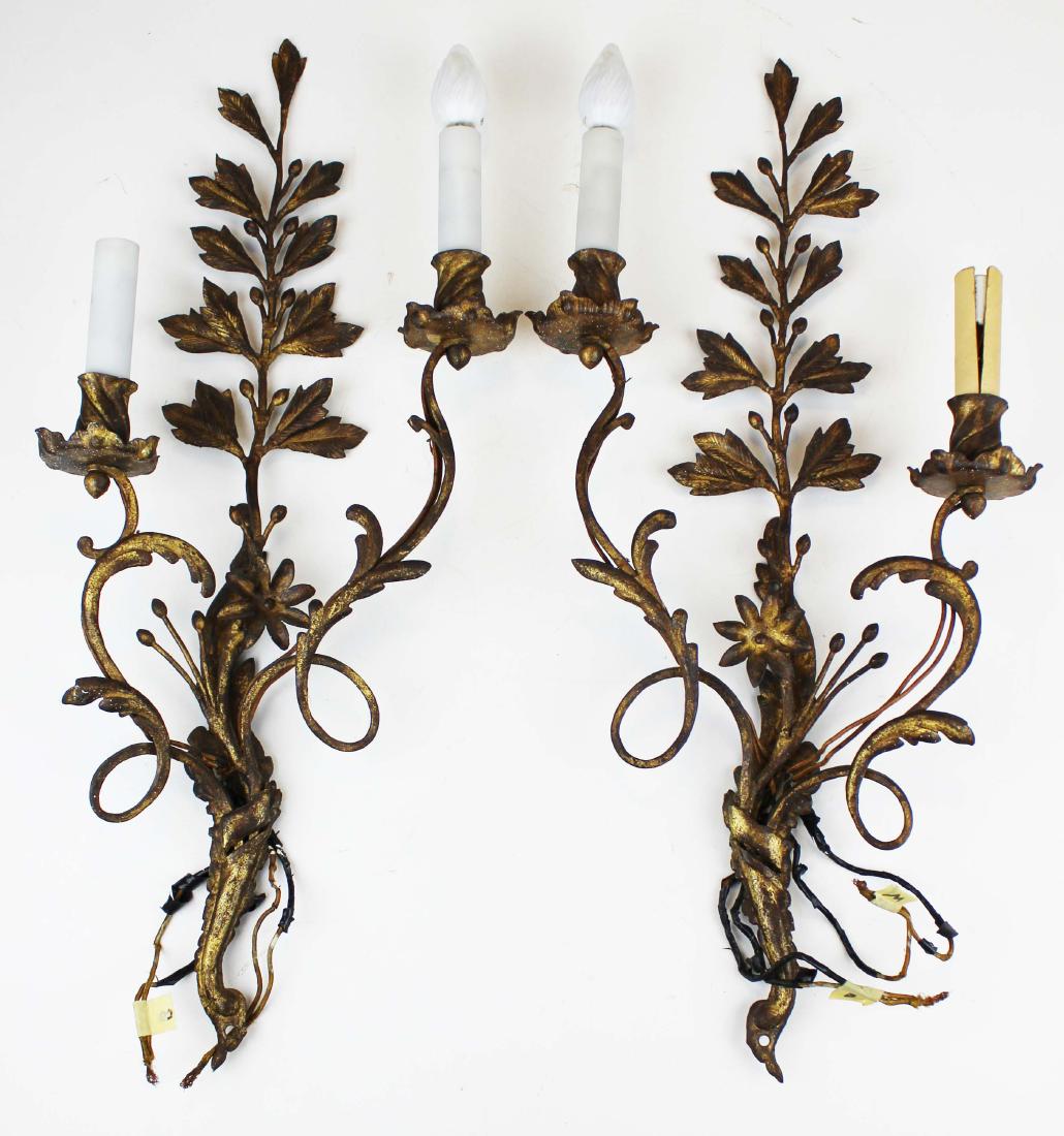 pair of early 20th c French wall sconces: pair of early 20th c gilt metal wall scones, stamped Made In France. Approx 23.5"h x 10"w x 4"d