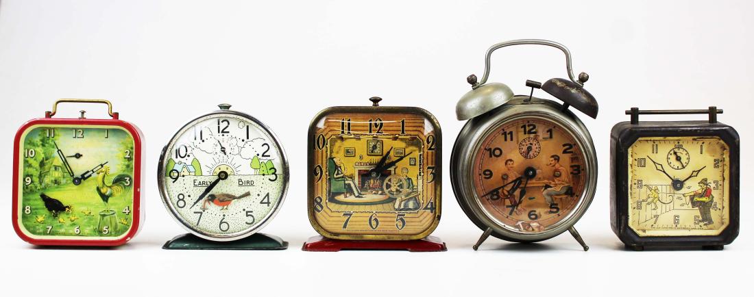 five early 20th c animated alarm clocks: five animated alarm clocks, including Lux Organ Grinder, Spinning Wheel, Smith Chicken Pecking, Unsigned Early Bird Getting the Worm, unsigned Cobbler, all sold as is, not warranted to be running, hts