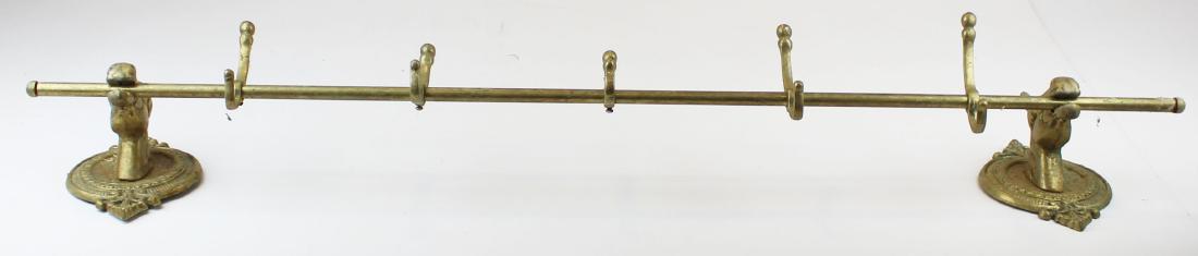 brass coat rack with horse head brackets: brass coat rack with horse head brackets, length 41"