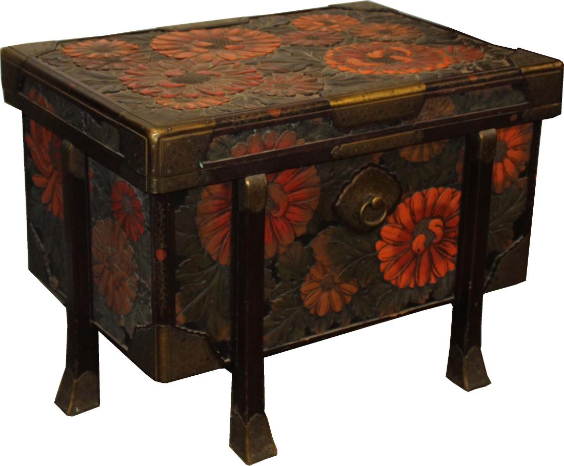 Japanese Meiji period karabitsu trunk: 19th c Japanese Meiji period karabutsu (literally "Chinese trunk", a traditional form of Japanese cabinet), multi colored lacquer over carved wood with engraved brass fittings, 32" x 22 1/2" x 23"