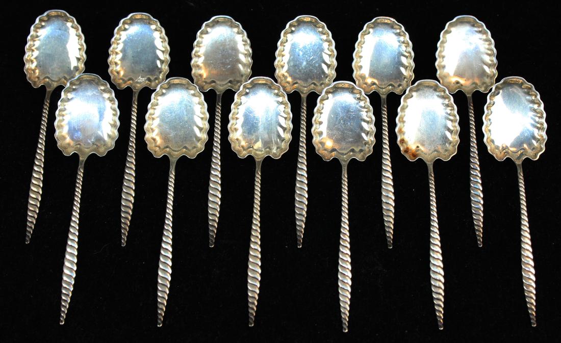 12 Whiting Oval Twist sterling dessert spoons: set of 12 Whiting "Oval Twist" pattern 1900 sterling silver berry or dessert spoons with scalloped bowls 5.5" x 1.5" 5.2 troy oz.
