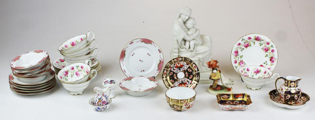 porcelain incl. Cauldon, Royal Crown Derby: lot of porcelain including 6 Cauldon rose decorated bone china teacups and saucers, 6 Limoges ramekins and saucers, 5 small pieces of Royal Crown Derby Imari pattern (one repaired), Hammersely miniatu