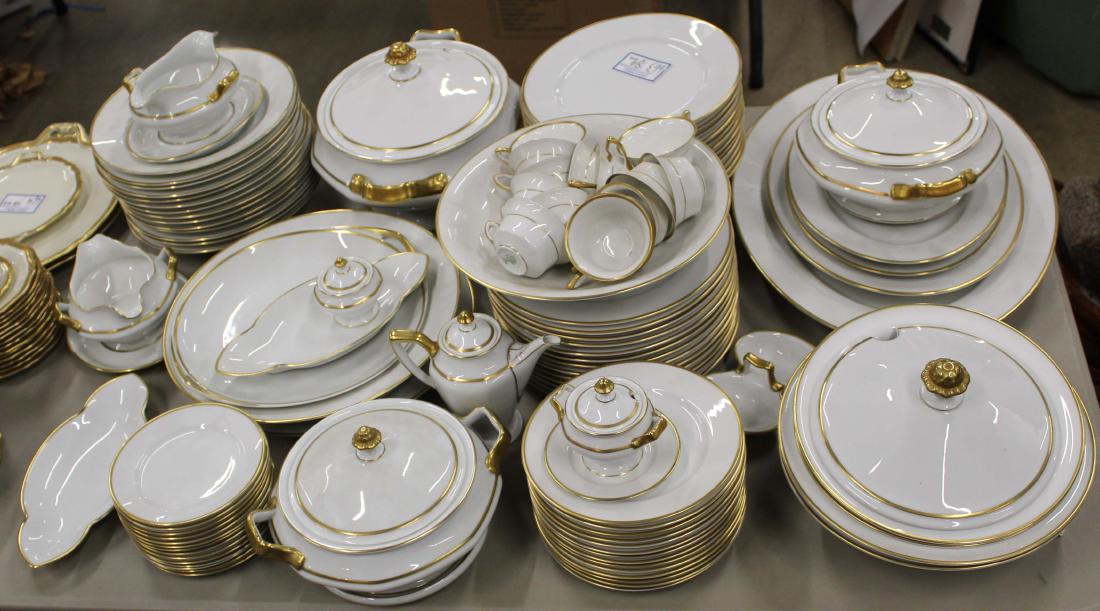 89 pcs. Rosenthal Corona Dinnerware: 89 pieces of Rosenthal "Corona" pattern white porcelain gold banded dinnerware including 55 Plates, 12 teacups, 22 serving pieces