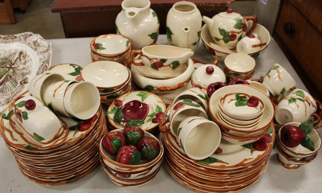 97 pcs. Franciscanware: 90 pieces of hand decorated Franciscanware apple pattern ceramic dinnerware including, 42 plates, 26 bowls, 9 teacups, 1 teapot, 2 pitchers, 17 serving pieces