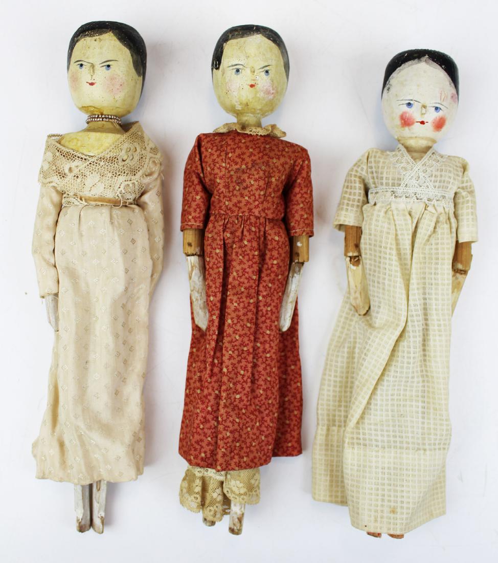 three 19th c Penny Wooden dolls Jul 19, 2019 Merrill's Auctioneers