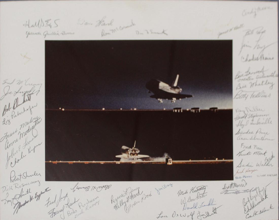 Space Shuttle signed photo: Autographed Space Shuttle photo with Staff and crew signatures surrounding photo