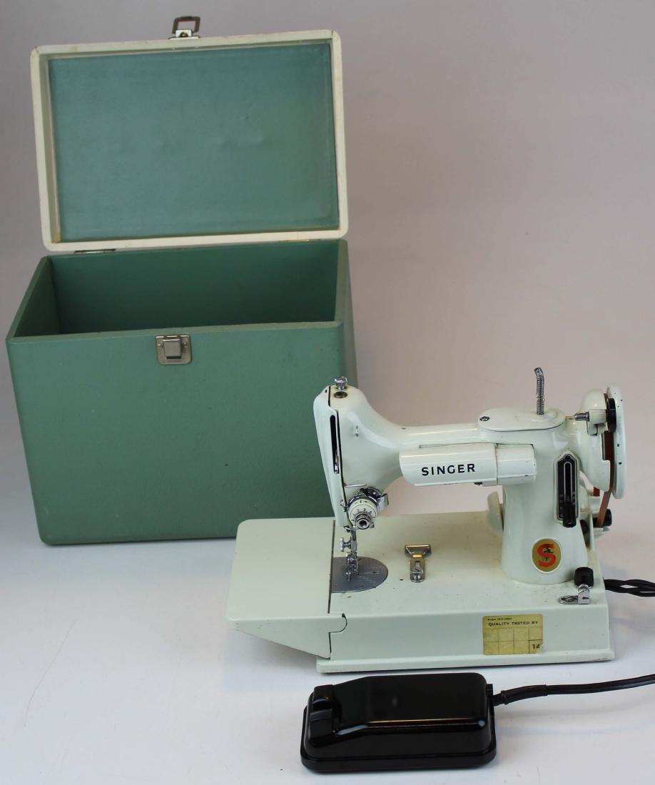 Singer Featherweight sewing machine in Mint Green: Singer featherweight sewing machine in unusual mint green finish. As found