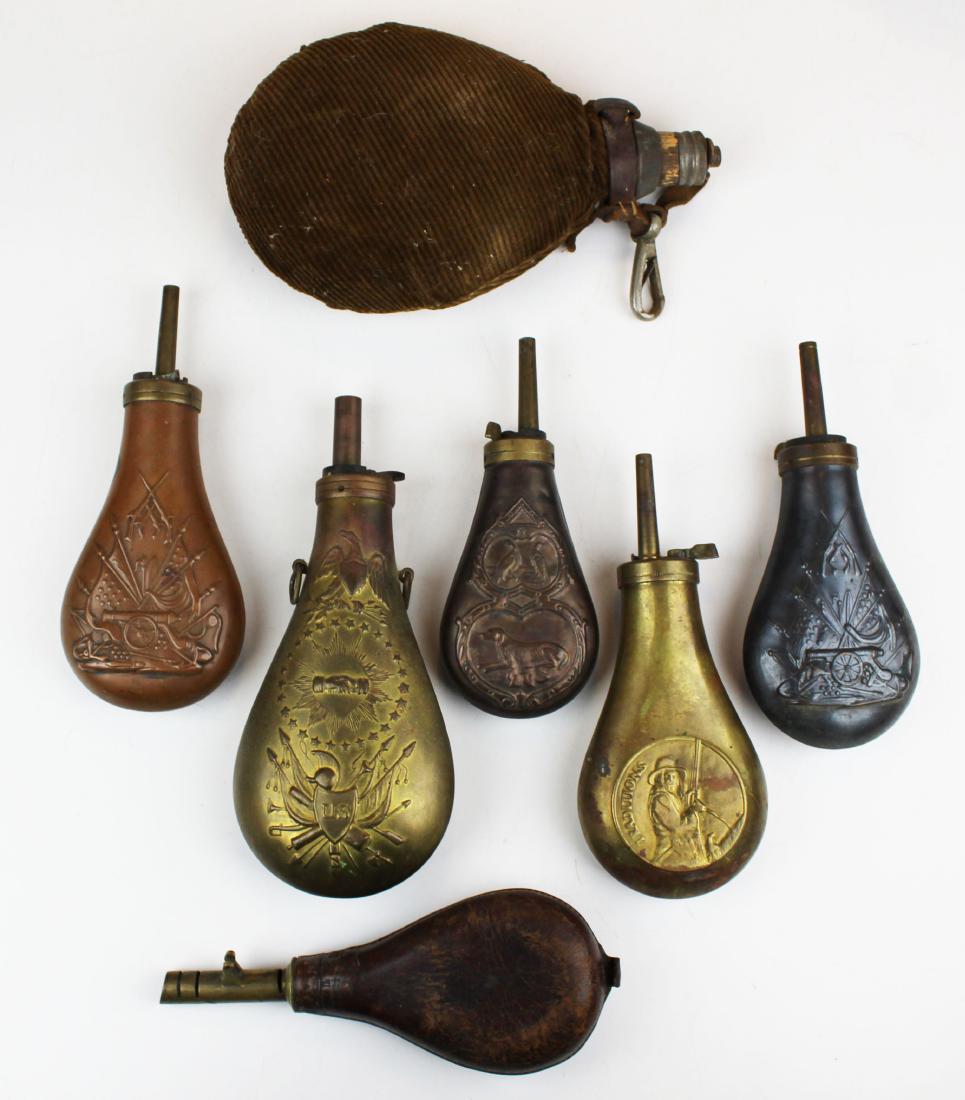 Lot of powder flasks: Lot of powder flasks including 19th c US Peace Flask, early canteen, other shot and powder flasks 7 pieces
