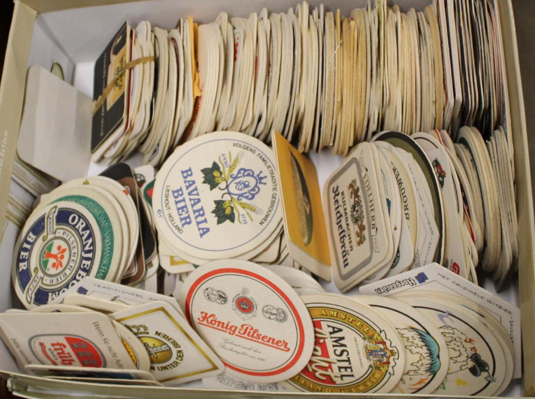 lot of vintage beer advertising coasters: large collection of vintage cardboard printed beer advertising coasters, from European breweries