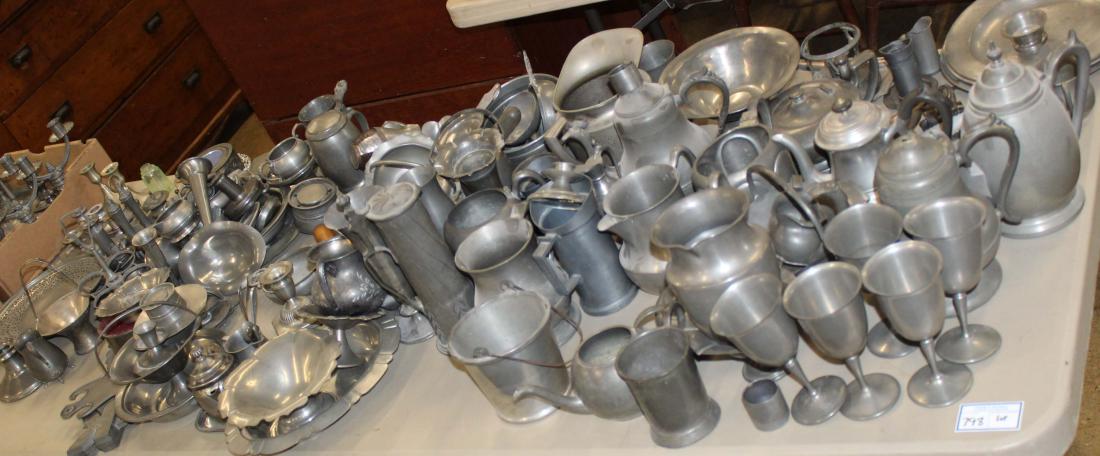 large lot of 20th c. reproduction pewter tableware: large lot of 20th c. reproduction Early American style pewter tableware including plates, goblets, serving pieces, tea pots, steins, etc. 50+ pcs.