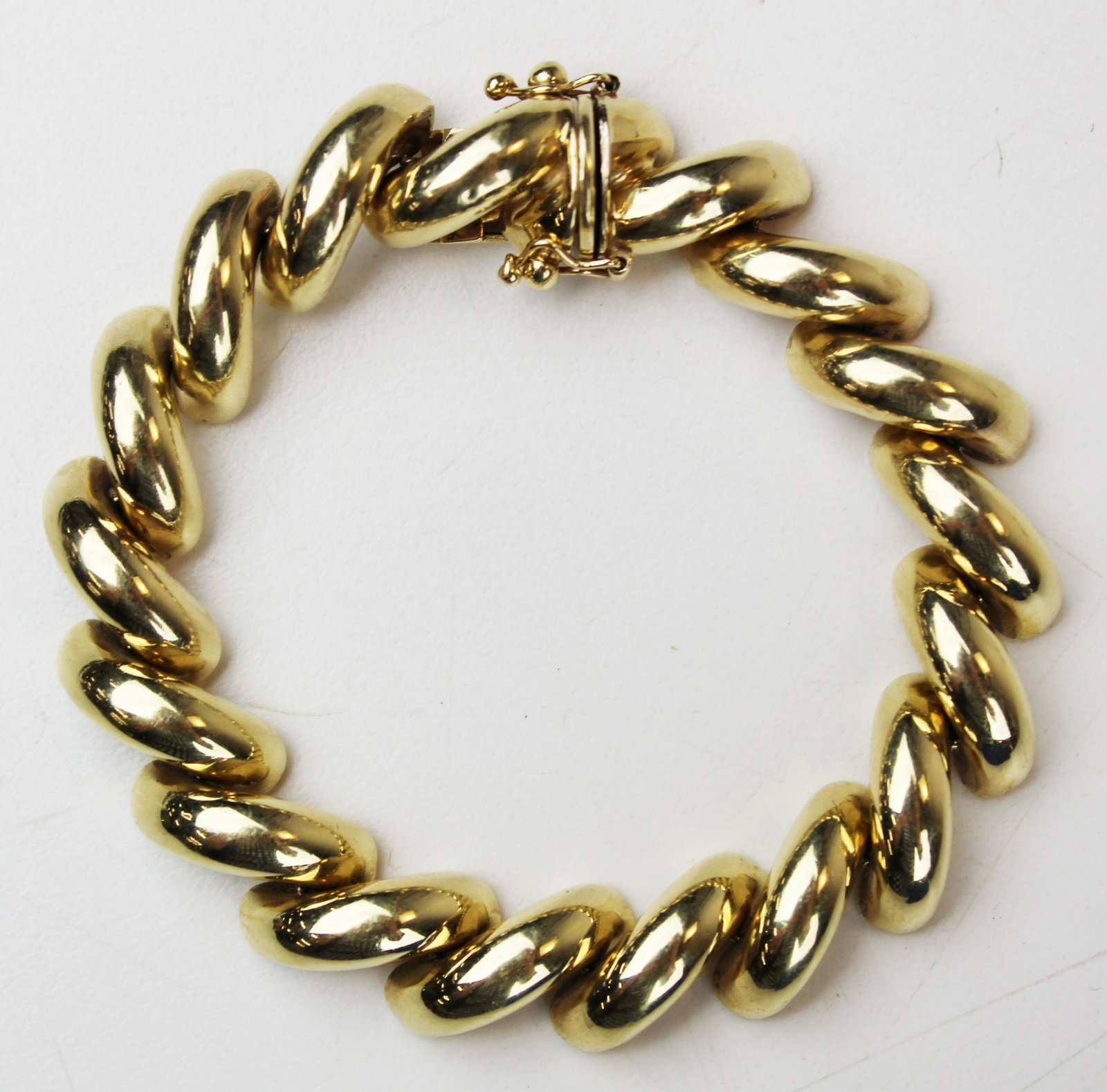 14k yellow gold chain bracelet: 14k yellow gold chain bracelet. 7 1/2" long. 27.9 grams.