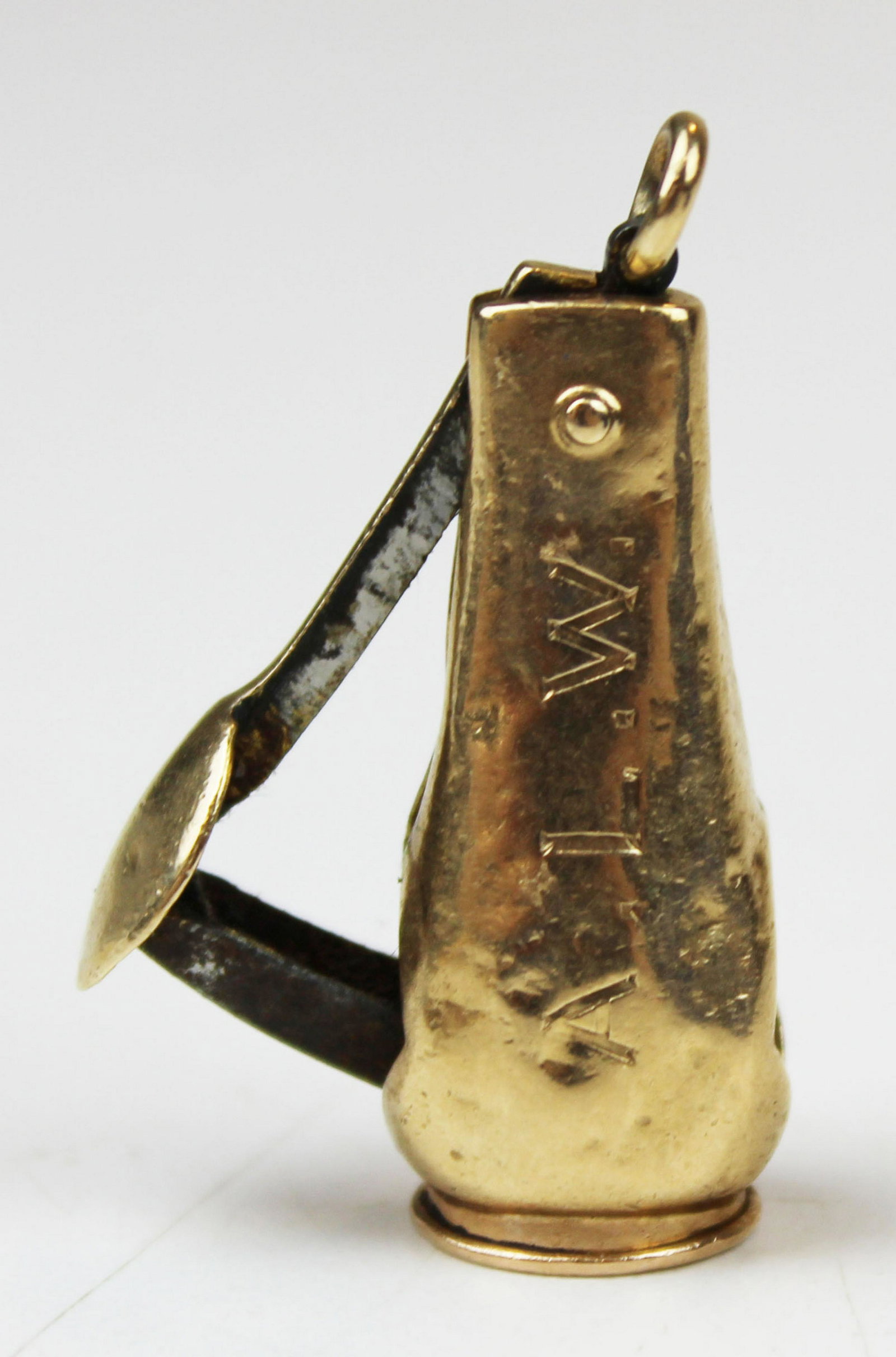 Ca. 1900 yellow gold cigar cutter: Ca. 1900 yellow gold cigar cutter. Monogramed A L W. Unmarked. 7 grams t.w