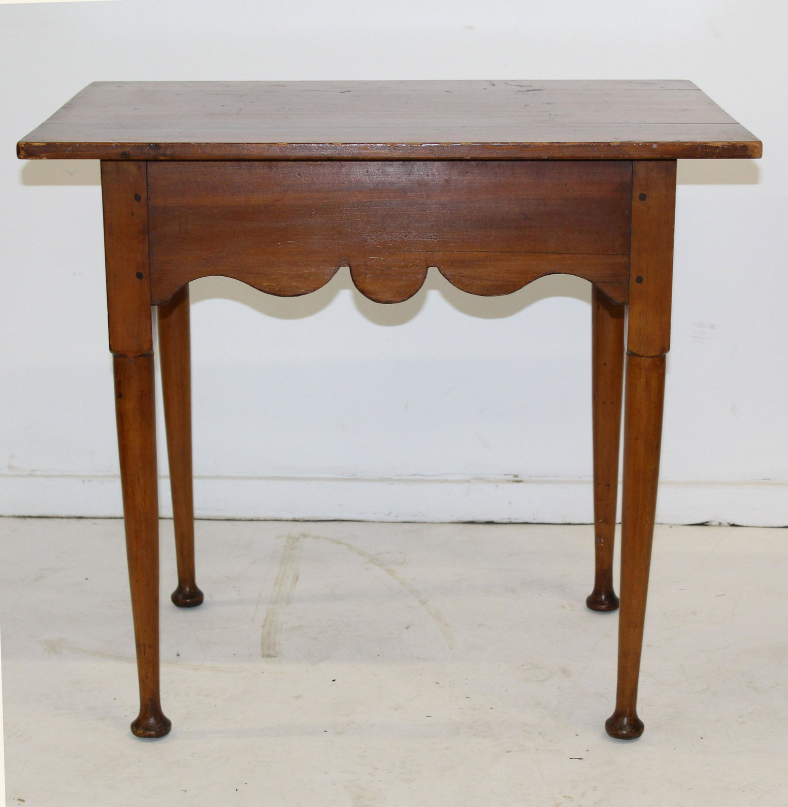 Queen Anne button foot tea table: 18th c. Queen Anne pine and maple button foot tea table, top replaced 30" L 27' ht.