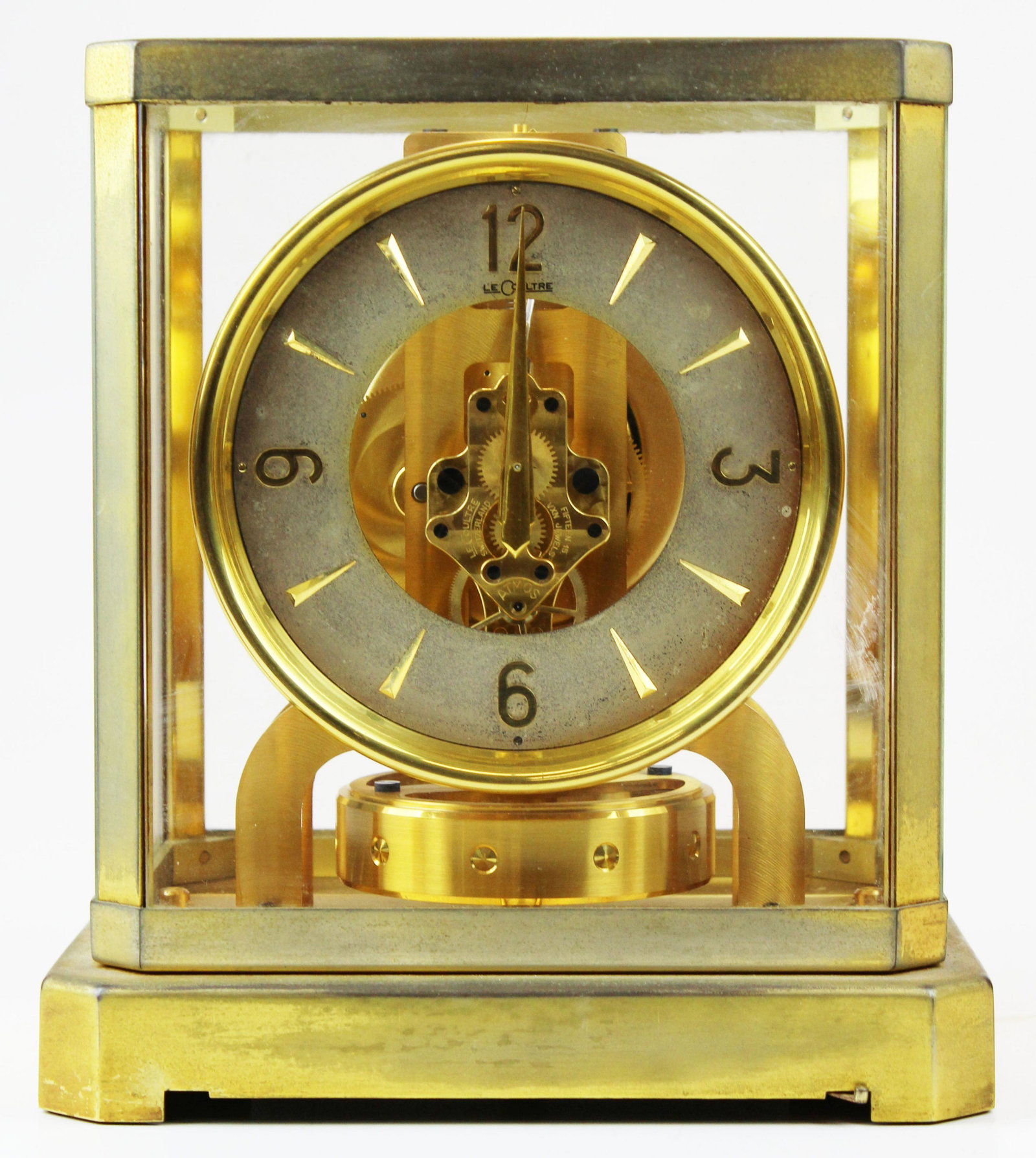 LeCoultre Atmos clock: LeCoultre Atmos clock, gilt brass & glass, worn tarnished gilt, ht 9 1/4"
