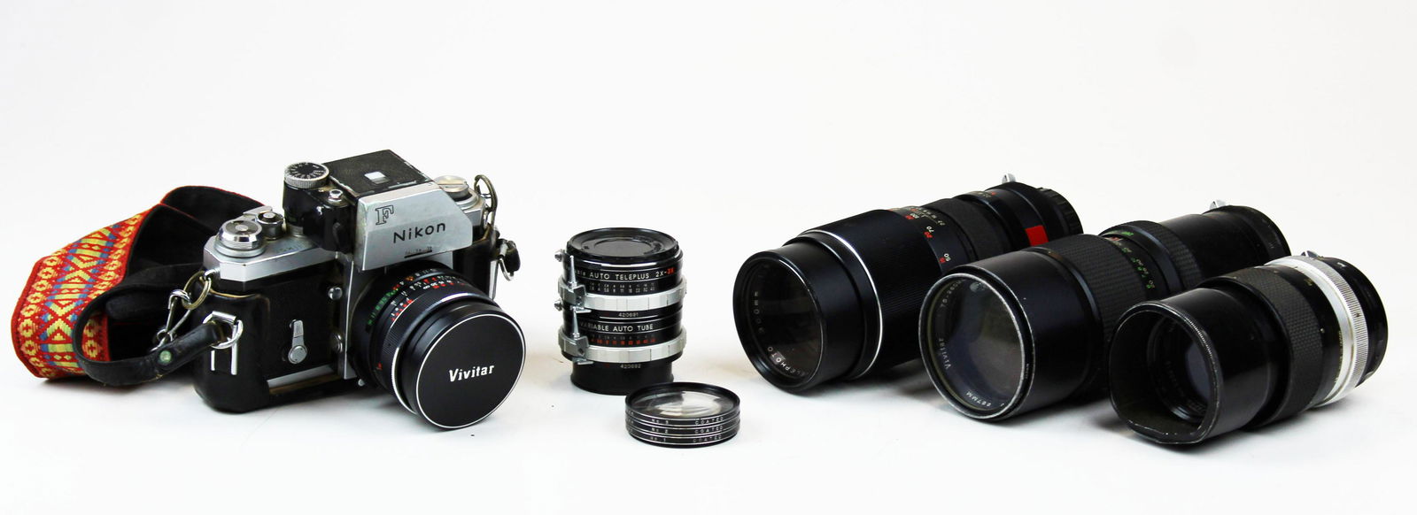 vintage Nikon F camera & Vivitar lenses: vintage Nikon F camera, Vivitar Telephoto 300 mm 1:5.5, Vivitar Autozoom 067 mm 1:4.5, Vivitar Wide-angle 1:2.8, Nikkor-Q Auto, Kenko Auto Teleplus 2x-3x, leather camera case