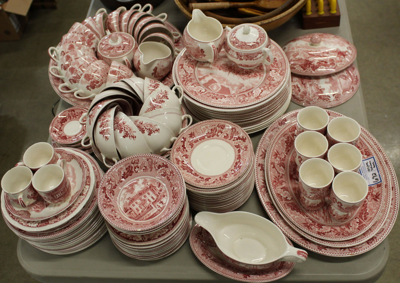 125 pcs. Johnson Bros. Historic America dinnerware: approximately 125 pcs. Johnson Brothers "Historic America" pattern patriotic red transferware porcelain dinnerware including plates, platters, cups, cream soups, tea set, etc. -some pieces with chips,