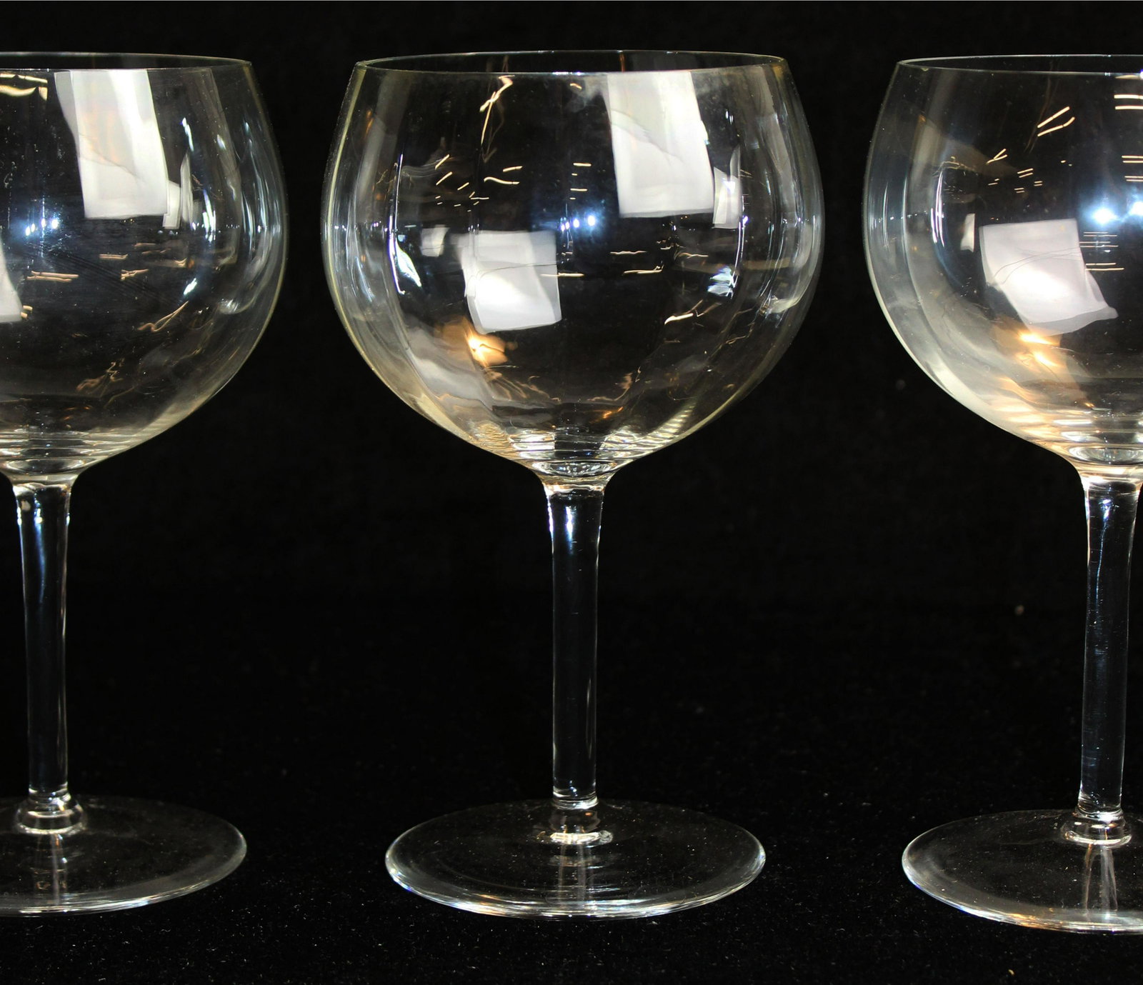 12 Tiffany and Co. ribbed chardonnay glasses: 12 ribbed crystal chardonnay stemmed wine glasses retailed by Tiffany & Co. 7" x 4" -unsigned