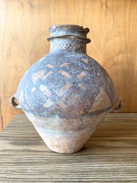 Chinese Han Dynasty clay vessel: Chinese Han Dynasty clay vessel. Double handled, geometric decoration, double handle, worn. 11" high.