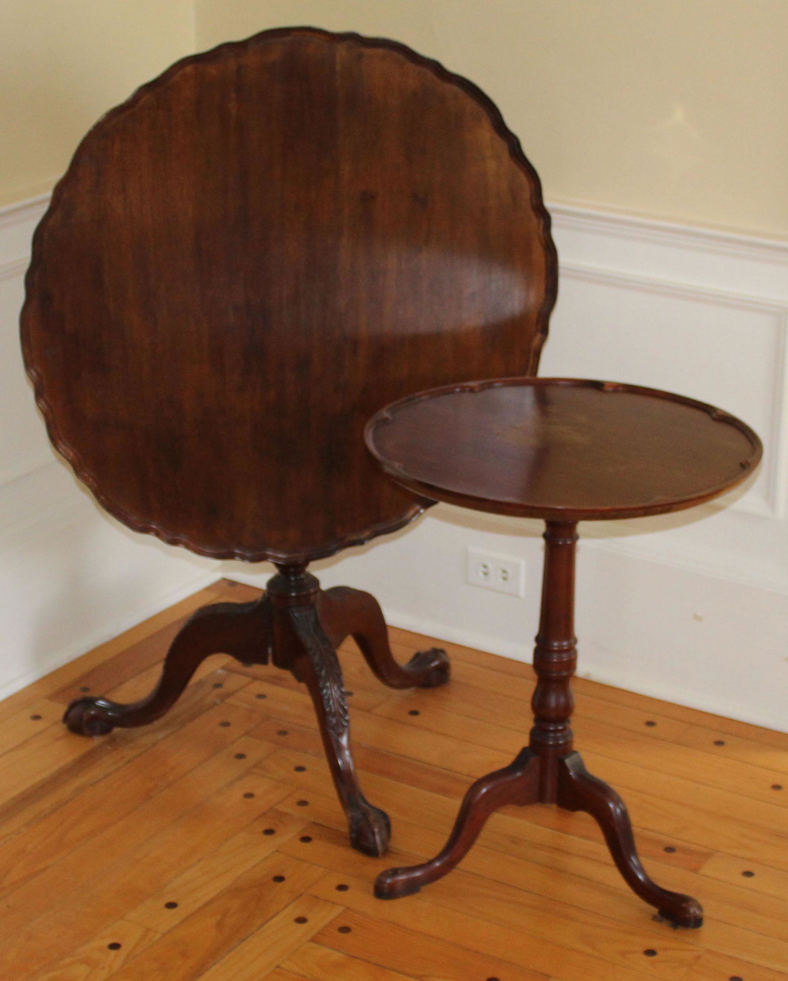 Two Queen Anne mahogany stands: Two Queen Anne mahogany stands including pie crust tilt top claw foot tea table and scalloped top snake leg stand 32" x 29", 21" x 27"