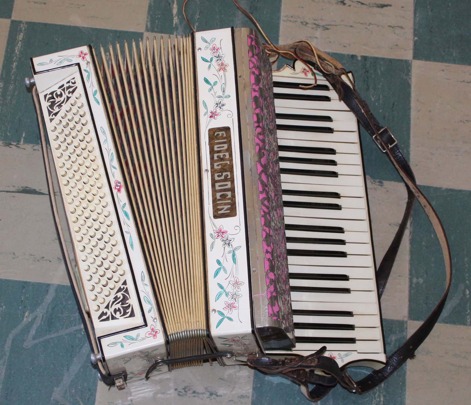 Fidel Socin Accordion: 20th c Piano Accordian with floral decoration and vulcanized fiber case