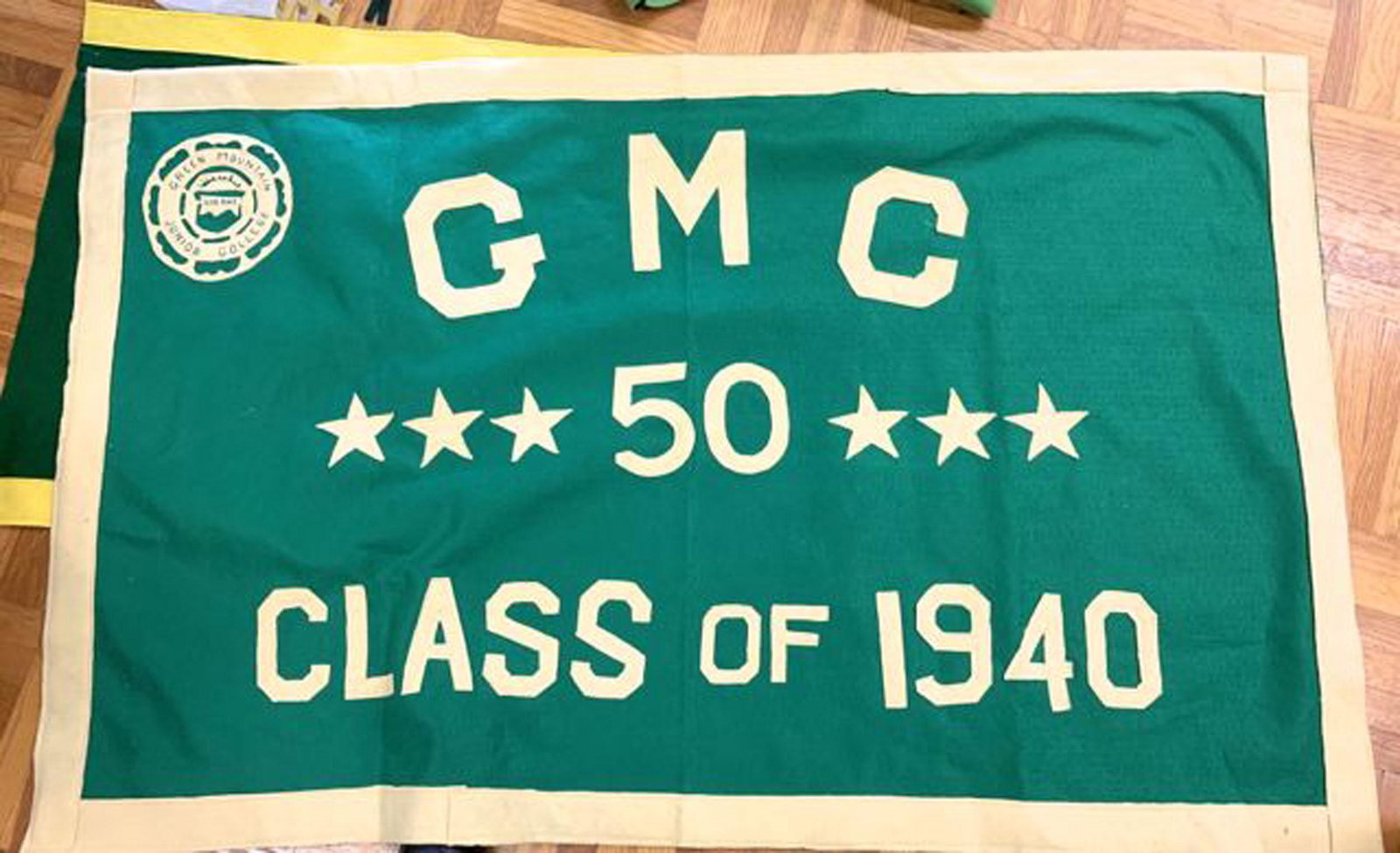 A Group of GMC banners and pennants: A group of 5 Green Mountain College banners and pennants
