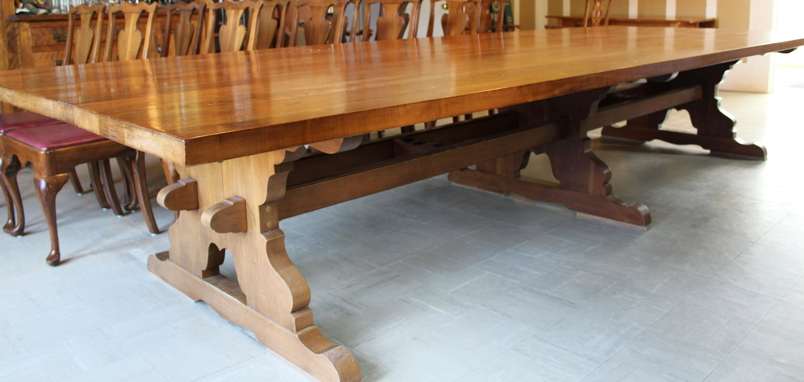 outstanding custom cherry trestle base table: outstanding massive 13.5" mid 20th c. custom cherry trestle base conference or dining table with three shoe foot lower supports, likely L. & J. G. Stickley Cherry Valley -NOTE: This item is very large