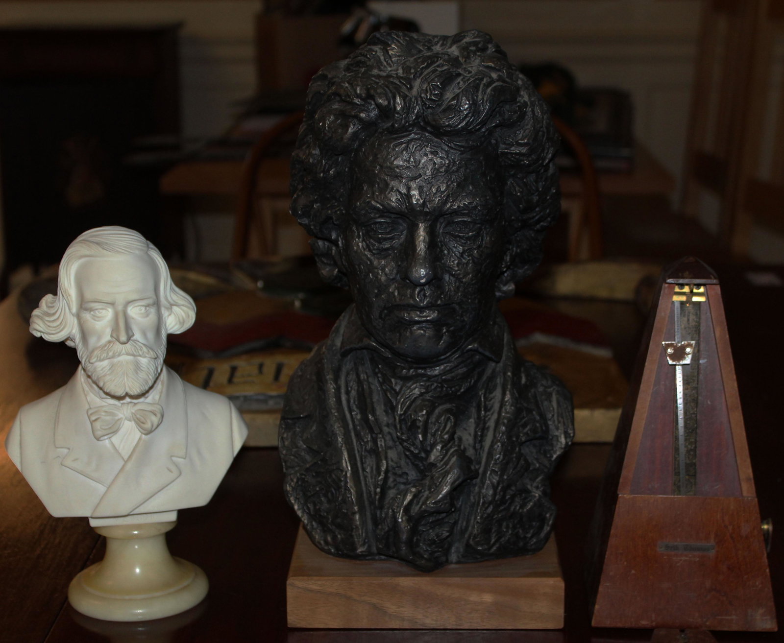 Two Busts and a Metronome: 19th or early 20th c marble bust of Verdi signed Gionnelli 9", Patinated Austin Sculpture of Beethoven 14"; and Seth Thomas Metronome.
