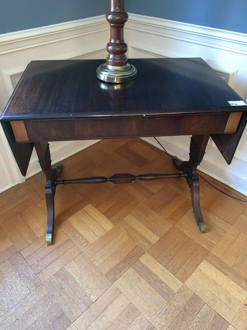 W & J Sloane mahogany regency style sofa table: fine early 20th c. W & J Sloane NYC bench made mahogany regency style drop leaf sofa table with inlaid skirt, concealed drawer, and acanthus carved neoclassical base, cast metal tag inside drawer 29.5