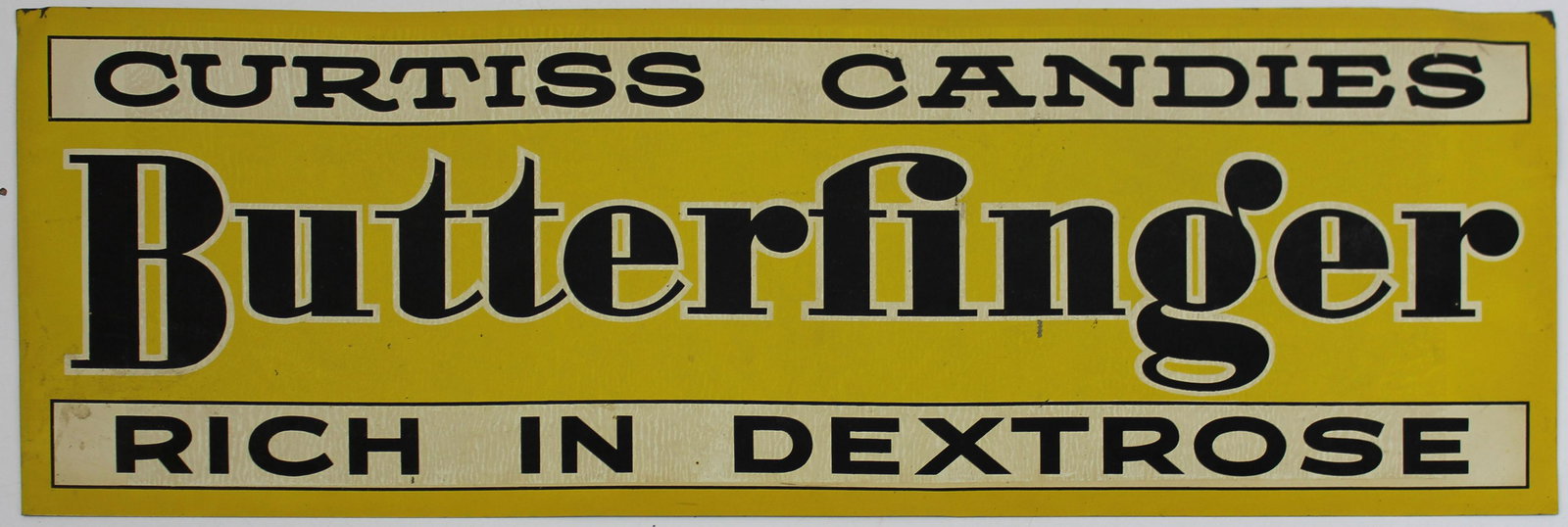 Curtis Candies Butterfinger tin litho sign: Curtis Candies Butterfinger Rich in Dextrose tin litho store sign 10" x 28"