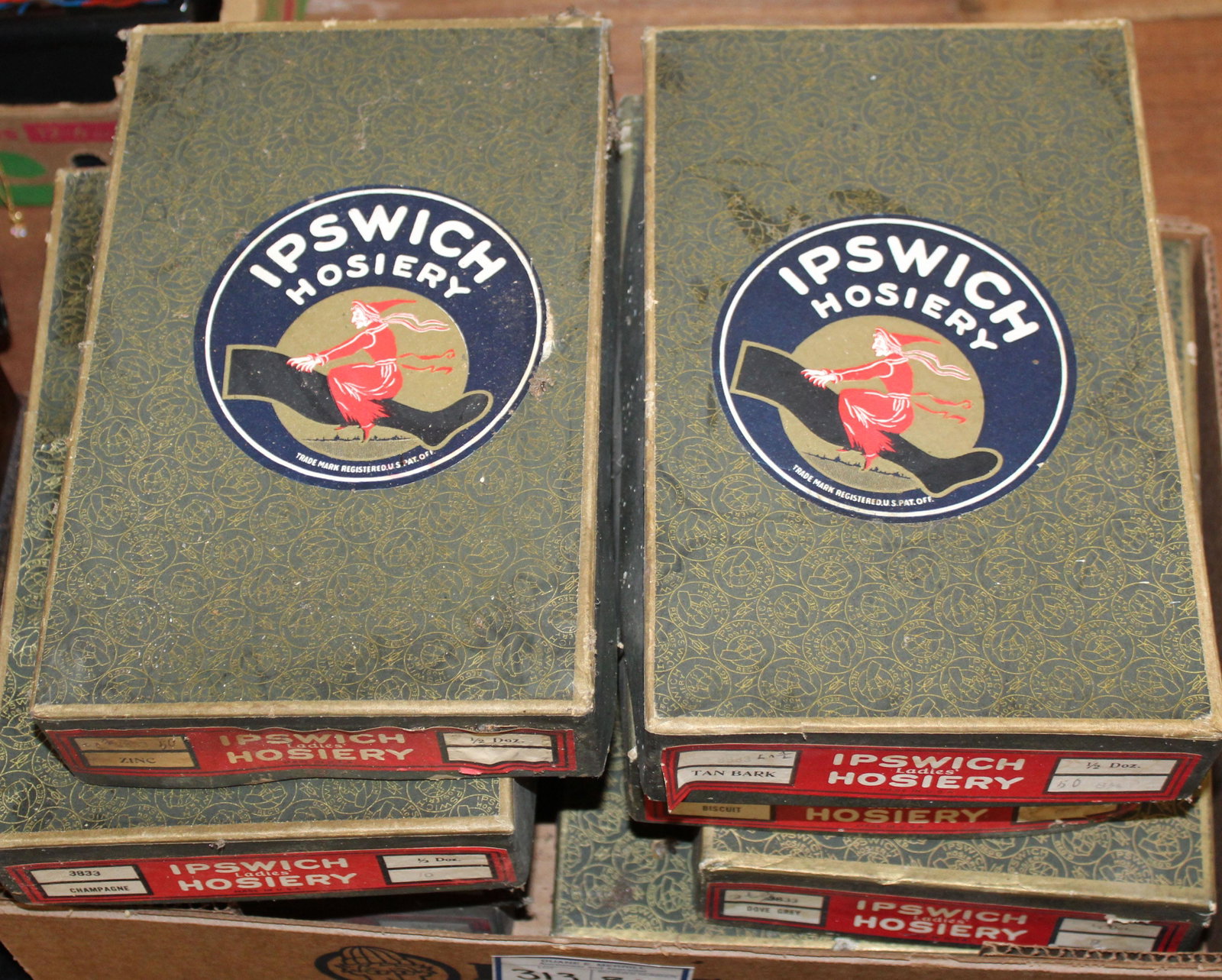 eight Ipswich Hosiery boxes with witch logo: Ipswich Hosiery boxes with witch logo (8 pcs), from country store attic, 6" x 10" x 2"
