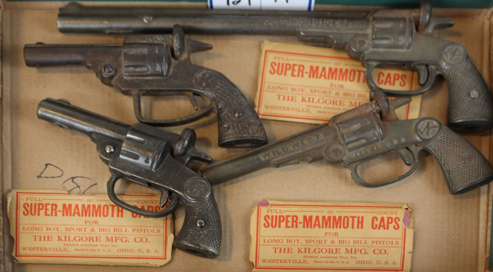 four early Kilgore, National, American cap pistols: four early Kilgore, National, American cap pistols, sold with three packages of Kilgore super-mammoth caps