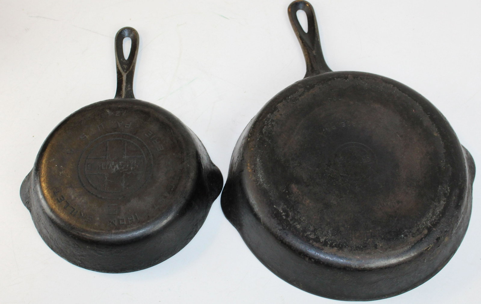 two Griswold cast iron skillets incl large block: two Griswold cast iron frying pans- #5 large block letters, #8 small block letters