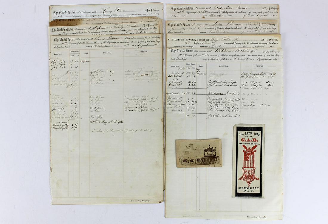 Civil War Documents and Ephemera: Lot of ten Civil War-era documents and pieces of ephemera, includes: eight Pennsylvania volunteer infantry clothing issuance ledger pages, each bearing the signatures of several soldiers; a CDV reprod