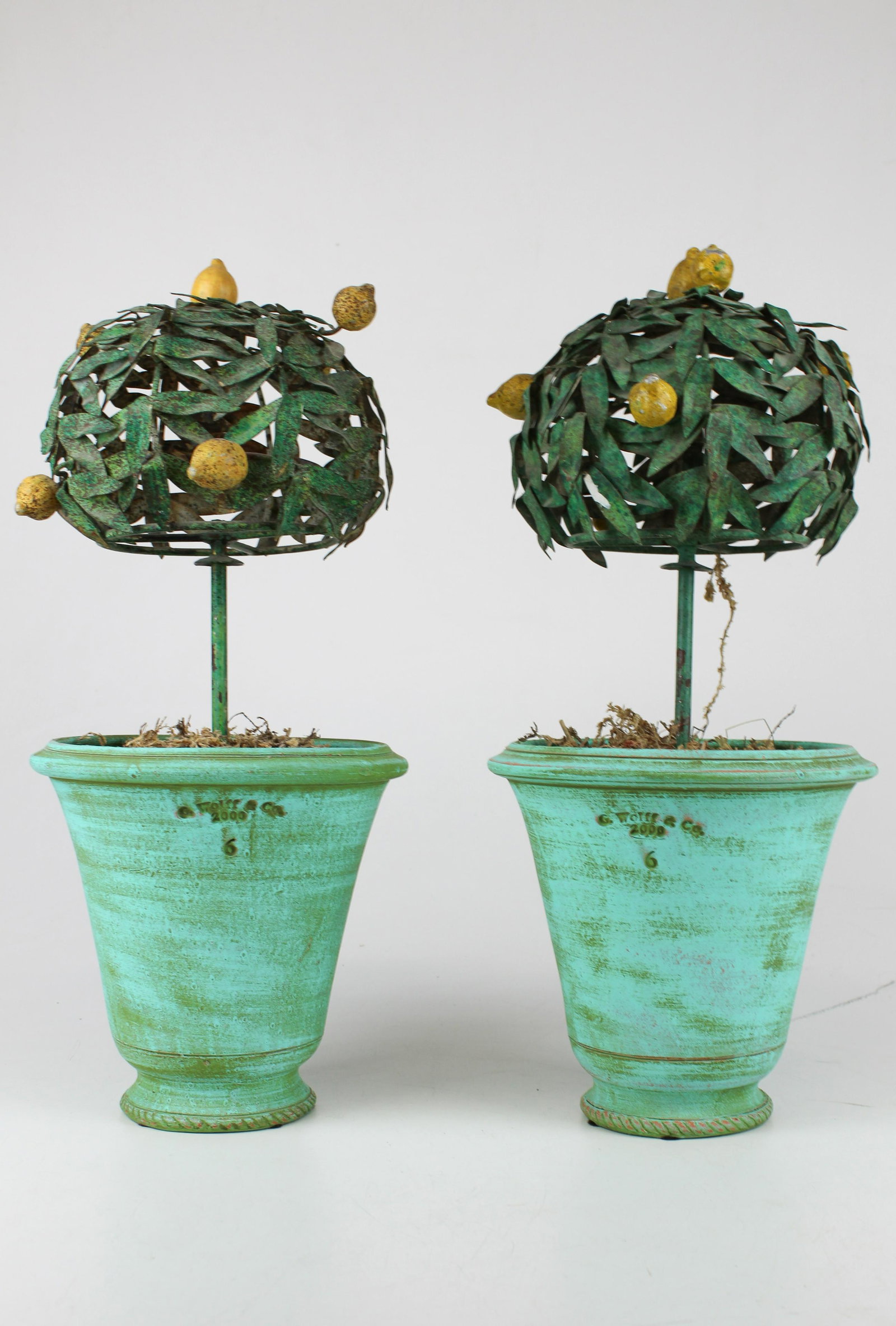 Italian gilt frame and pair of metal sculptures: Ca. 1900 open work gilt Italian frame with mirror 10" x 12" and a pair of metal cold painted lemon trees in pots 20" h.