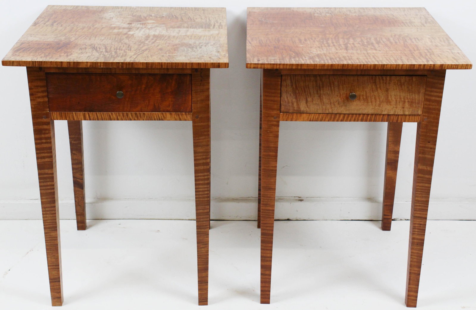Pr of Hepplewhite style tiger maple one stands: Fine late 20th c. highly figured tiger maple Hepplewhite style taper leg one drawer stands, possibly Eldred Wheeler 29" x 20" x 17" -some sun fading, water damage